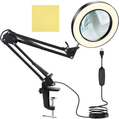 Černá kulatá lampa s LED podsvícením a zvětšovacím sklem - Obrázek
